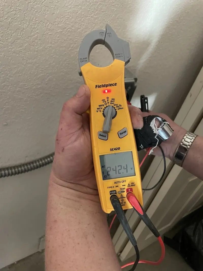 Voltage testing with clamp meter during Generator Installation in Ville Platte